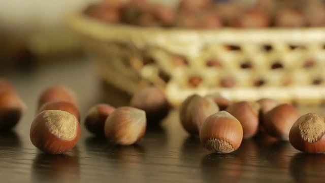 filbert nuts. Placer in a wicker basket, close-up
