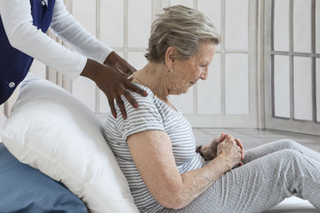 Senior woman having neck and head physiotherapy massage 