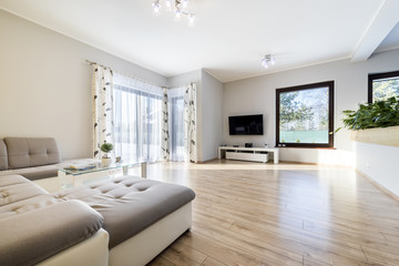 Fototapeta na wymiar Interior modern living room with wooden floor