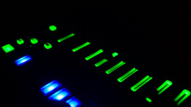Synth Bass in The Dark With Glowing Lights