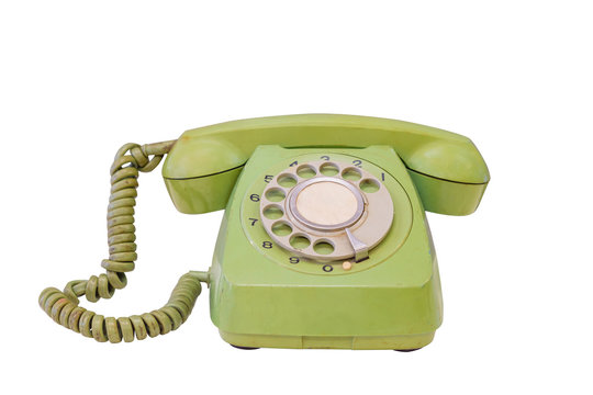 Green retro telephone isolated