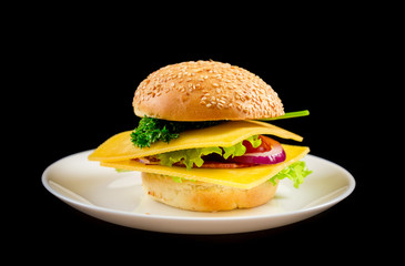 Sandwich with cheese and lettuce in dish