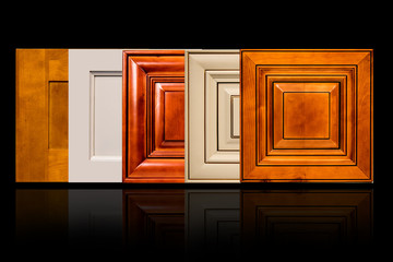 Set of luxury kitchen cabinet modern doors made of natural wood for home interior decoration.