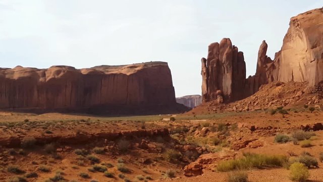 Zoom view on a road at a valley in mountain valley, on the border of Arizona and Utah, In United states of America