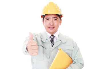 ガッツポーズの作業員