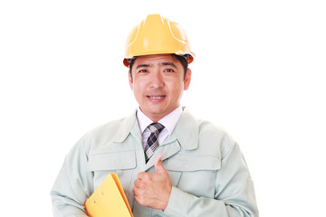 ガッツポーズの作業員