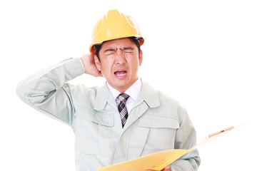 疲れた作業員