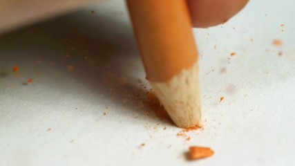 Orange Color Pencil Tip Breaking Super Slow Motion - Powered by Adobe