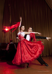 Beautiful couple in the active ballroom dance