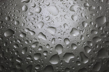 Water drops on dark wall and light, water drop for background 