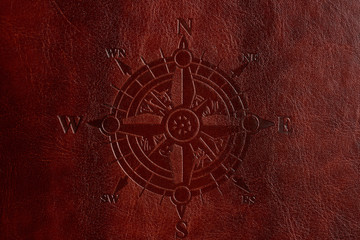 Compass on brown leather