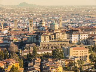 Fototapeta na wymiar Bergamo - Old city (Citta Alta). One of the beautiful city in Italy. Lombardia. Landscape of the old city from San Vigilio hill during a beautiful day.