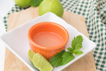 green lemon fresh in bowl