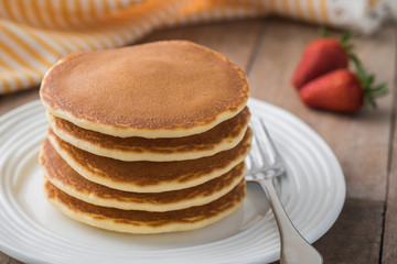 Stack of pancakes on plate