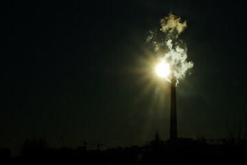 thick smoke belching from factory chimneys