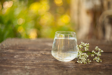 Mineral water in  crystal glass on  table