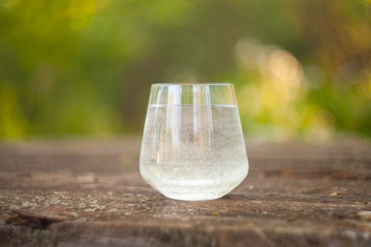 Mineral water in  crystal glass on  table