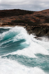 Heavy seas pound the windy north coast of Aruba