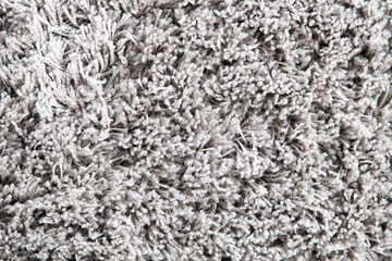 Light grey wool carpet cloth texture for design and background. 
