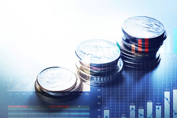 Coin money stacked growing with graph chart.Business financial