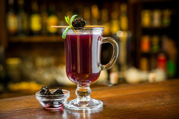 mulled wine with wine in the glass on the bar