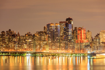 Naklejka premium Nightlight of New York City Manhattan downtown with the reflecti