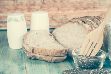 organic food chia seed and slice bread on wood table
