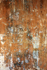 Old stucco wall texture of brown color