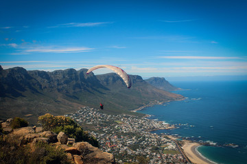 Fototapeta premium Paragliding over Cape Town, South Africa