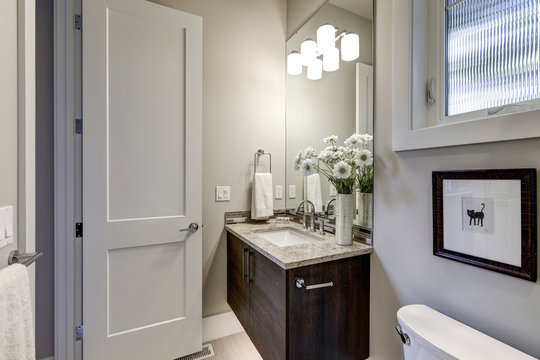 Light gray bathroom interior in luxury home