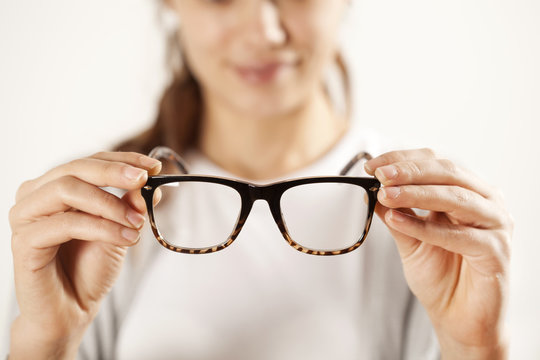 Woman Hands Holding Eyeglasses