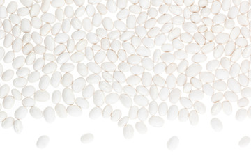 Border of white  kidney beans closeup with copy space on white background. Isolated. Healthy protein food.