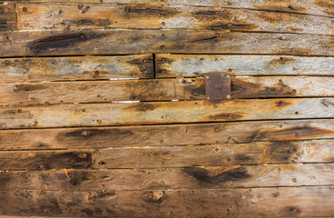 Fragment of old wood boat hull