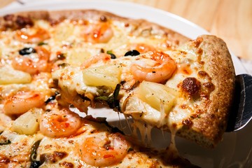 shrimp pizza on plate