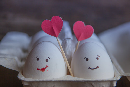 Love eggs couple with heart in the box