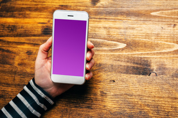 Mockup of woman using smartphone, top view