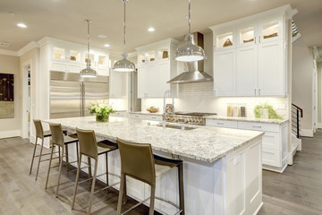 White kitchen design in new luxurious home - 133615269
