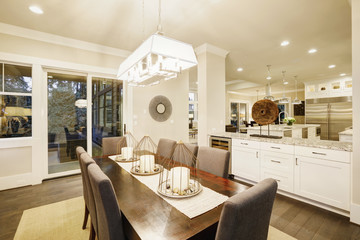 Lovely dining room with rectangular table and grey chairs