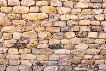 background and texture of granite stone wall surface.