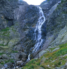 waterfall high in the mountains