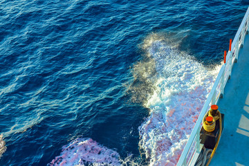 Ferry breaking waves on the sea
