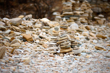 Rocks stacked on the Livadi beach on Thassos Island, Greece
