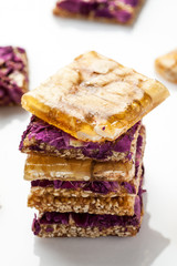 Stack of oriental sweets on a white background