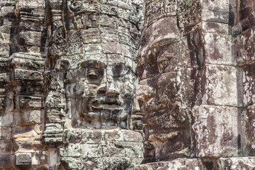 Fototapeta premium Bayon stone faces tower in Angkor Wat, Siem Reap, Cambodia.