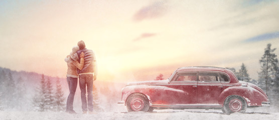 loving couple and vintage car