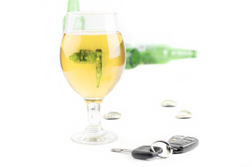 Car Keys And Glass Beer With Empty Bottles On White Background