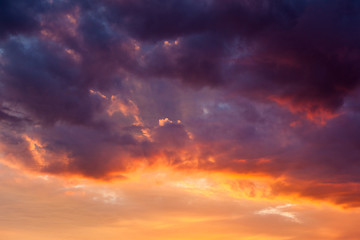 Fototapeta premium Fiery vivid sunset sky clouds