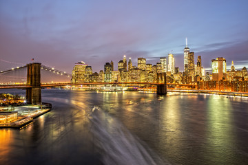 Fototapeta na wymiar New York Skyline at Night from Manhattan Bridge