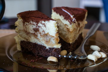 Two pieces of cake on the plate.