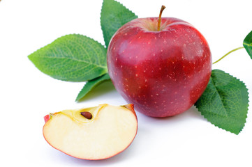 red apple with leaves and section isolated on white background